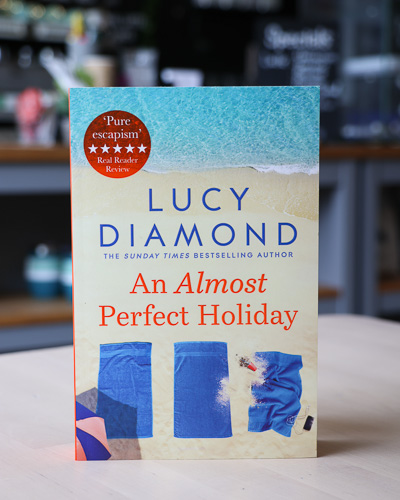 An image of the book cover for An Almost Perfect Holiday by Lucy Diamond