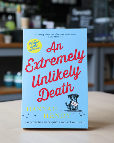 An image of the book cover for An Extremely Unlikely Death by Hannah Hendy