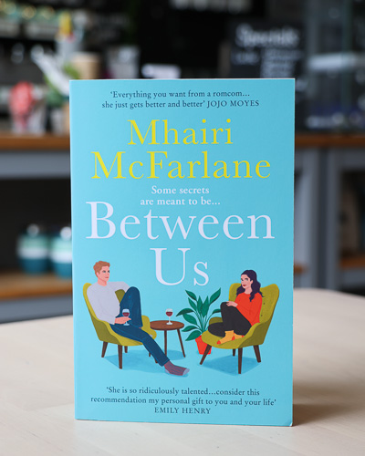An image of the book cover for Between Us by Mhairi McFarlane