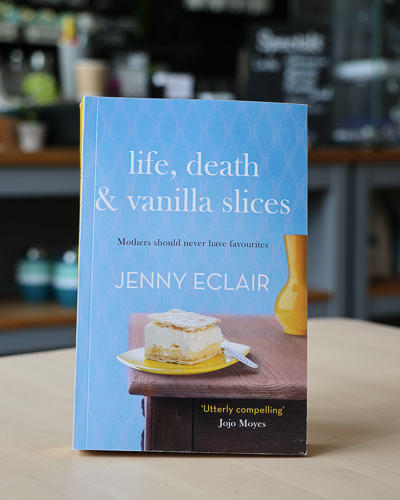 An image of the book cover for Life, Death and Vanilla Slices by Jenny Eclair