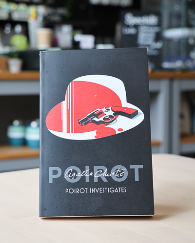 An image of the book cover for Poirot Investigates by Agatha Christie