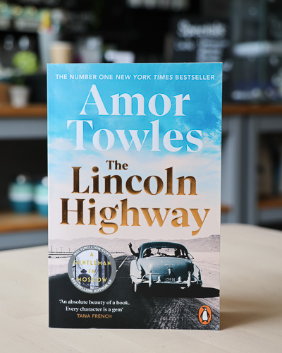 An image of the book cover for The Lincoln Highway by Amor Towles