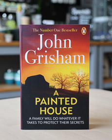 An image of the book cover for A Painted House by John Grisham