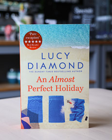 An image of the book cover for An Almost Perfect Holiday by Lucy Diamond