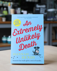 An image of the book cover for An Extremely Unlikely Death by Hannah Hendy