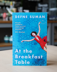 An image of the book cover for At the Breakfast Table by Defne Suman