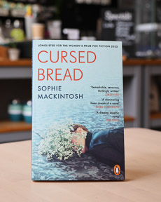 An image of the book cover for Cursed Bread by Sophie Mackintosh