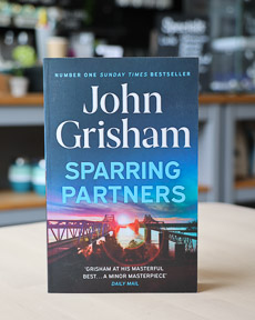 An image of the book cover for Sparring Partners by John Grisham