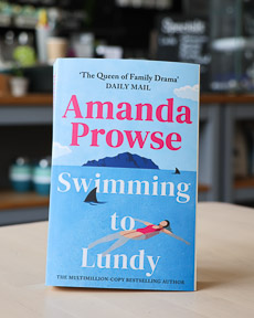 An image of the book cover for Swimming to Lundy by Amanda Prowse