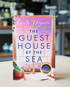 An image of the book cover for The Guest House by the Sea by Faith Hogan