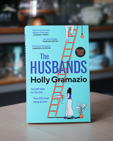 An image of the book cover for The Husbands by Holly Gramazio
