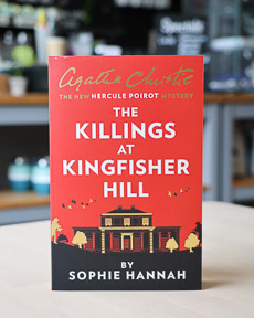 An image of the book cover for The Killings at Kingfisher Hill by Sophie Hannah