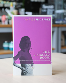 An image of the book cover for The L-shaped Room by Lynne Reid Banks