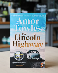 An image of the book cover for The Lincoln Highway by Amor Towles