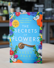 An image of the book cover for The Secrets of Flowers by Sally Page