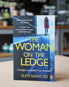 An image of the book cover for The Woman on the Ledge by Ruth Mancini
